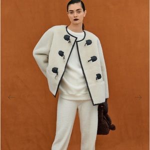 Clasp front shearling coat, vanilla color